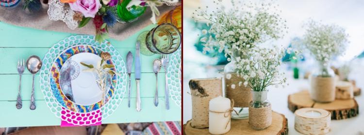 Buntes Gedeck auf blauem Tisch und Blumen und Kerzen auf Untersetzer aus Holz